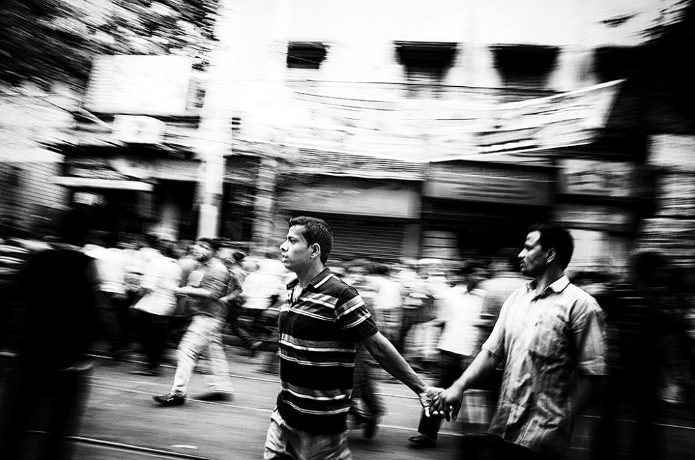 Girish Park,Kolkata,India-March 2016.Rushing By-The road in the area is so narrow that it was difficult for the cranes and the ambulances to move rapidly ,thereby delaying the process.On top of that ,people had to be cleared without any further damage