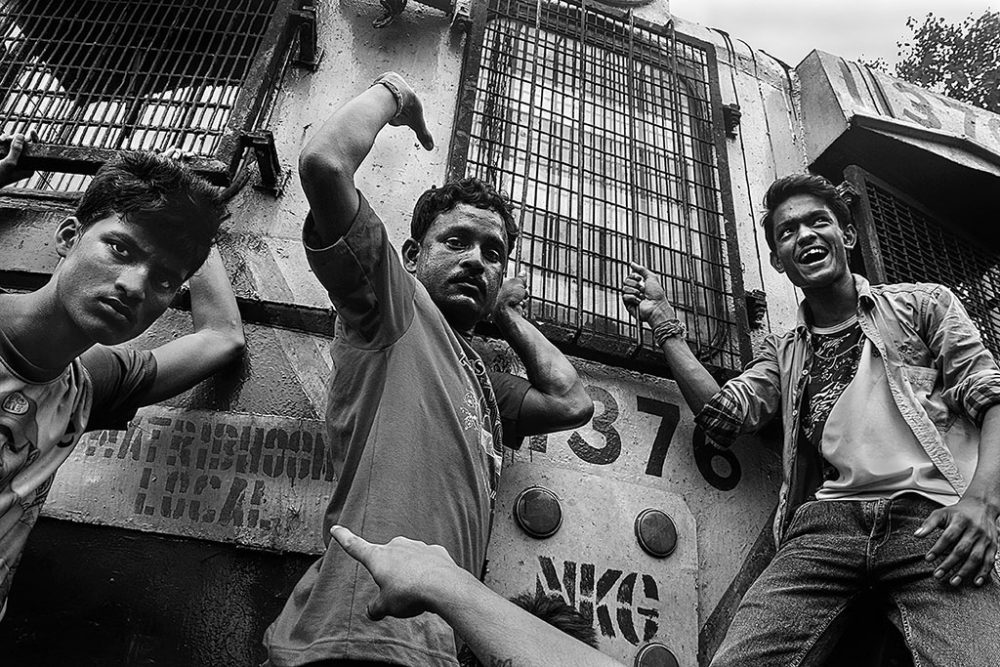 Birati, Kolkata, India - 19th August 2015. A mass gathered infront of the train and stopped it as an act of vengeance.