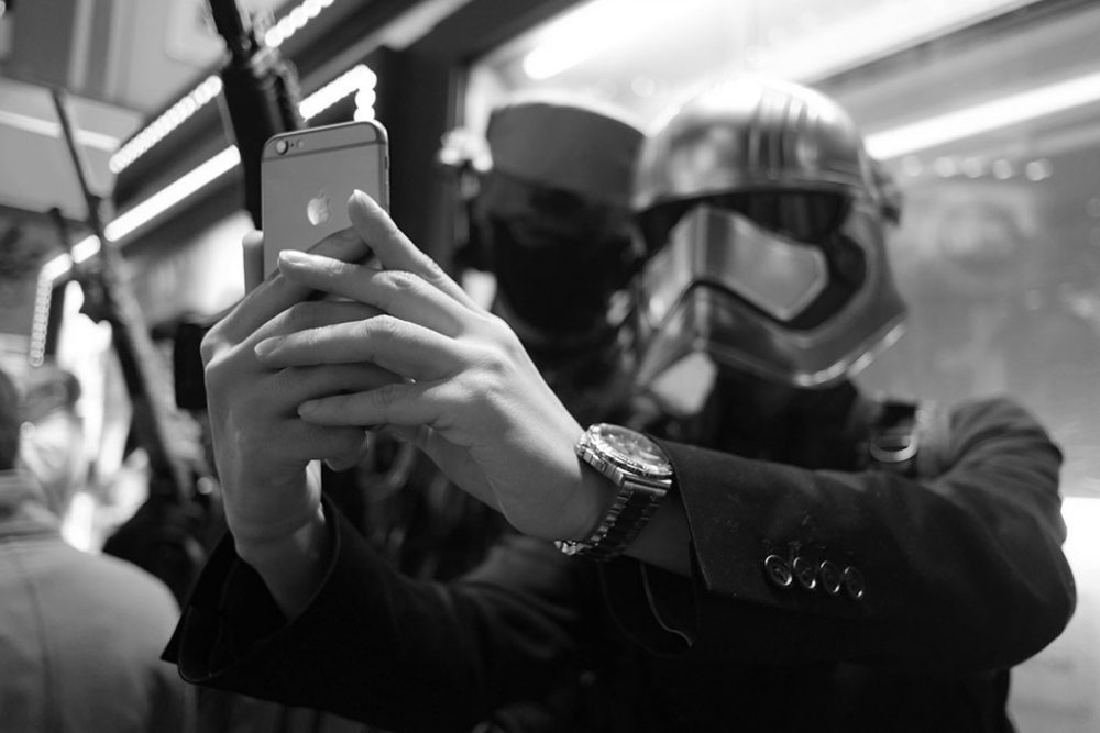 TOKYO, JAPAN - October 2015. Party goer dressed as Star Wars' character takes selfie.