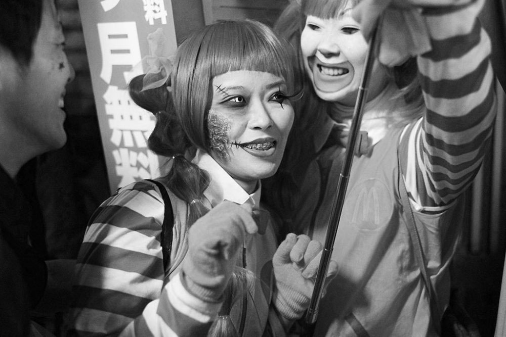 TOKYO, JAPAN - October 2015. Friends dressed as zombie Ronald McDonalds.