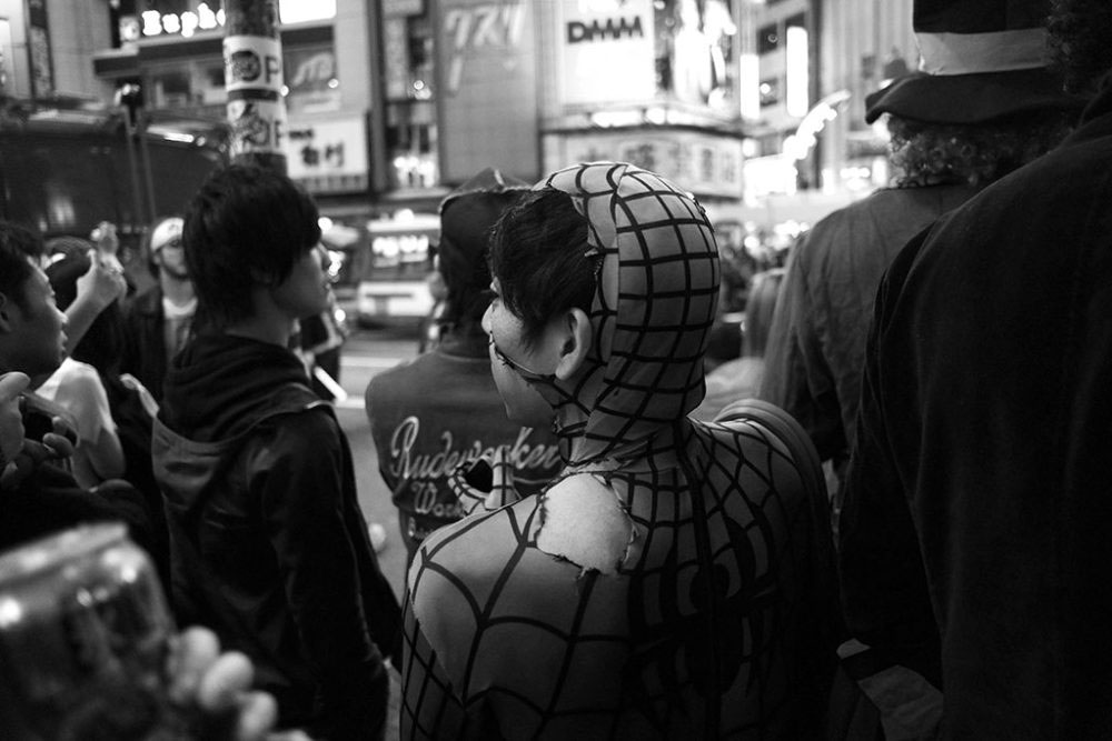 TOKYO, JAPAN - October 2015. Boy dressed as tattered Spiderman.