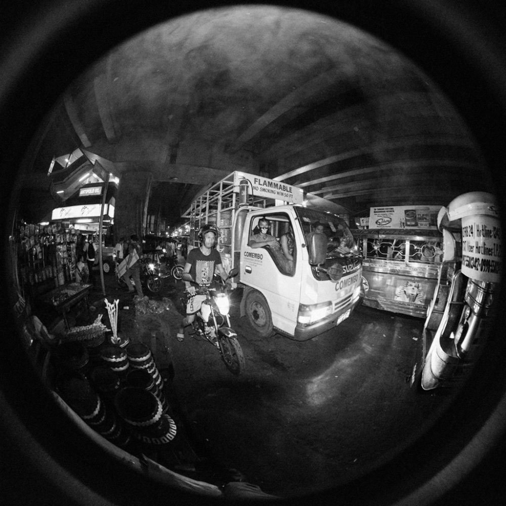 Pollution fills an underpass where the traffic is at a standstill.