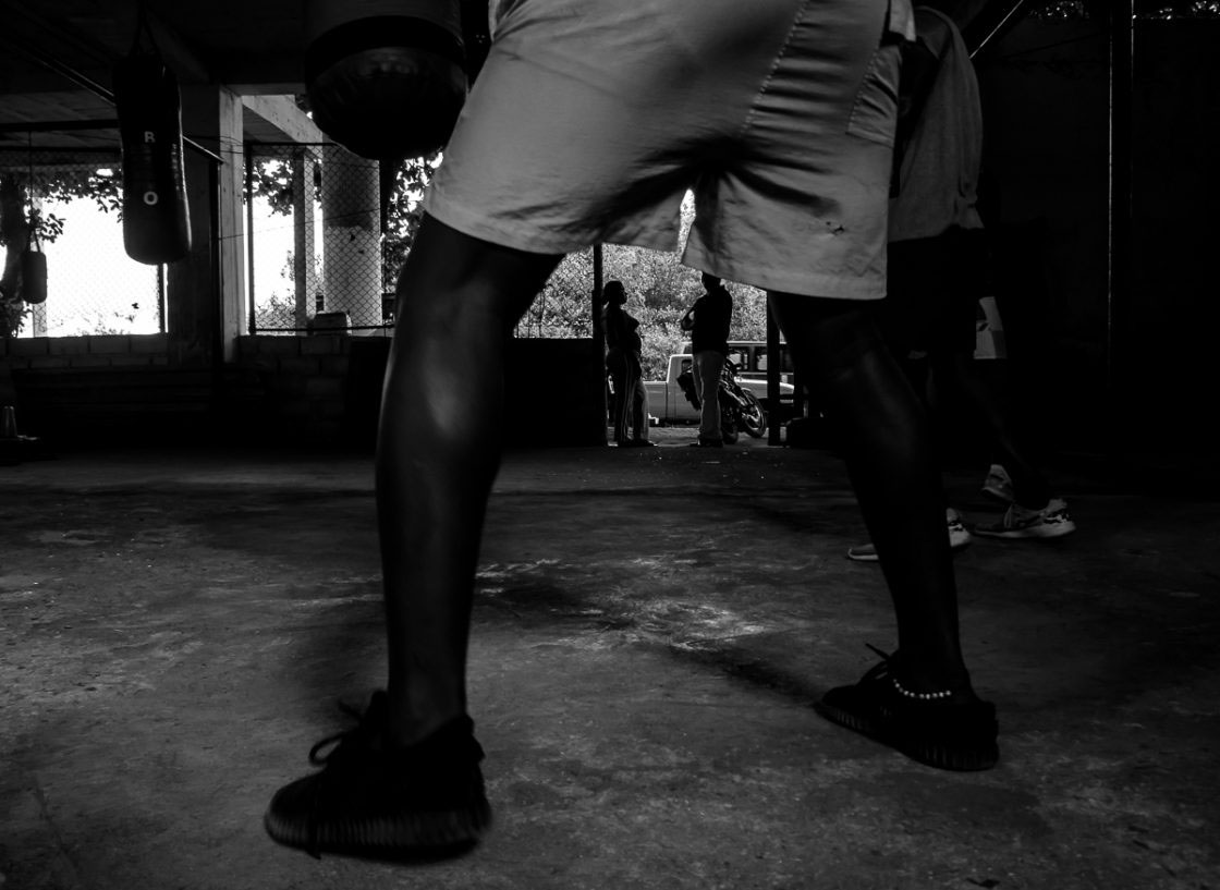 San Andrés, Colombia - October 2016. Friends of the gym often come and watch the students train, giving their opinion on techniques and talents.